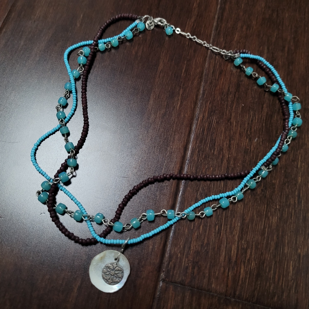 Turquoise and Brown Beaded Necklace with Silver Pendant